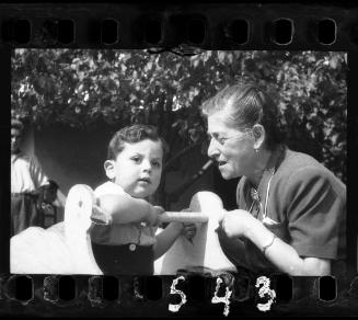 Older woman with a young boy