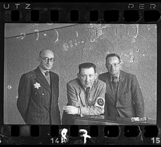 A Jewish policeman and two members of the Food Supply Department