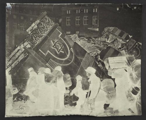 (In photomontage with synagogue in ruins) Boy in cap, with satchel and sack tied to back, walking with winter deportation crowd - side-profile