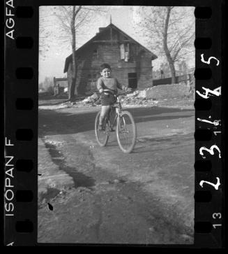 Portrait of a boy on a bike