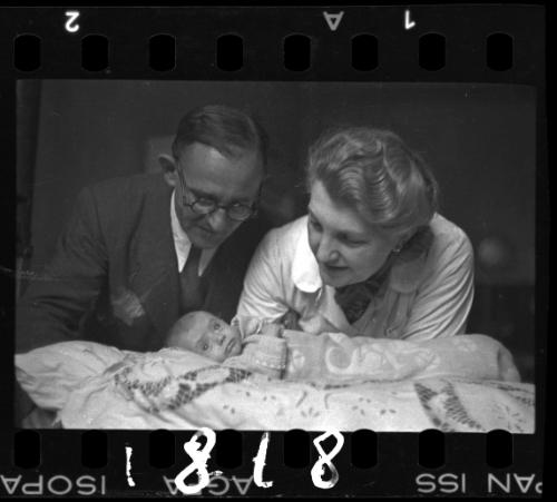 Mother and father with a baby