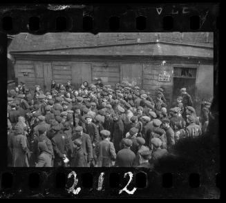 People protesting in front of kitchen against food which contained 98 percent water, Lodz Ghetto