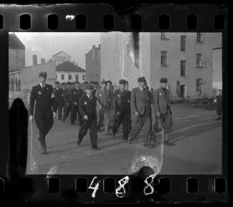 Jewish police marching in the ghetto