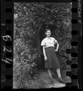 Portait of a young woman in a garden