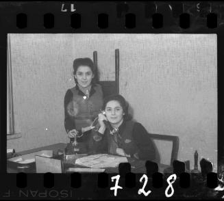 Women at desk with telephone