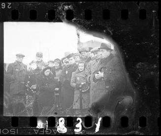 Residents gathered in the ghetto cemetery