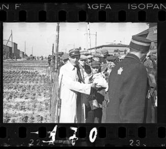 Jewish policemen assisting with deportation