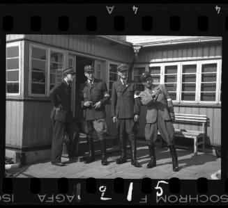 Four Jewish policemen in the ghetto