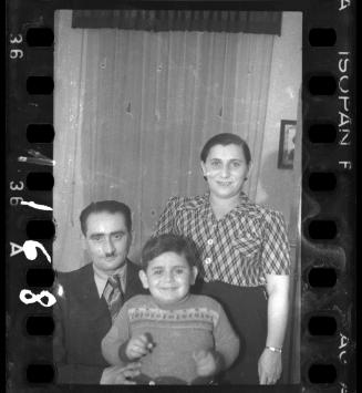 Portrait of family of three