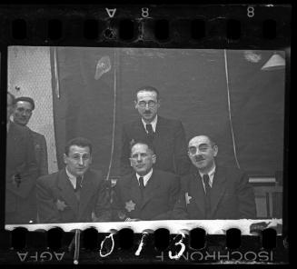 Portrait of four men [probably members of the Judenrat, the Jewish Council]