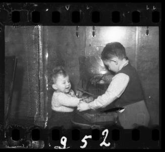 Two boys looking for their pet