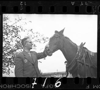 Dr. Kagan, hospital administrator, with a horse
