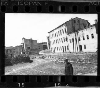 Man standing in front of an empty lot