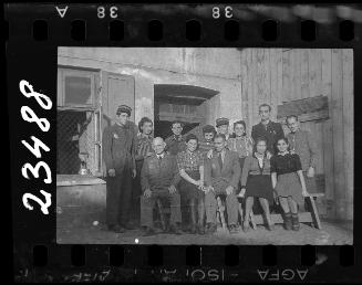 Administrators and employees outside the bakery