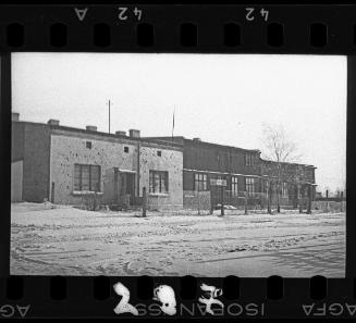 View of unidentified buildings in the ghetto in winter
