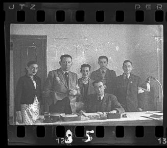 Members of the ghetto administration in an office in the ghetto