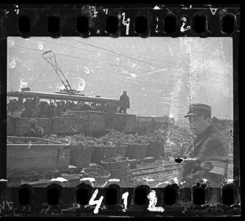 A Jewish policeman overseeing the delivery of food to the ghetto