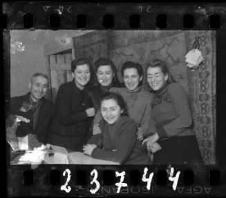 Group portrait of six residents smiling