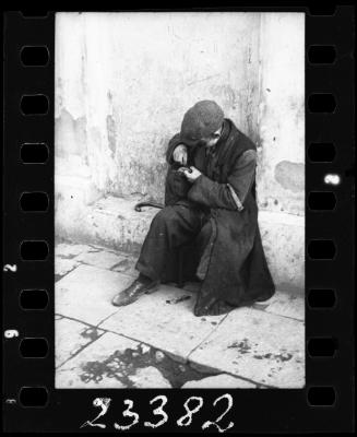 Man sitting on the street