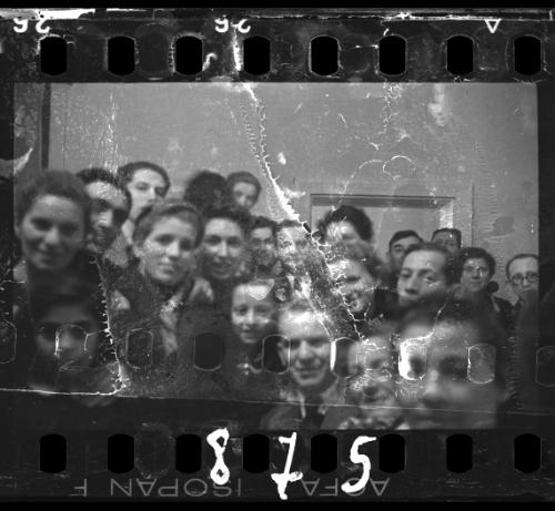 Residents at a social gathering in the ghetto