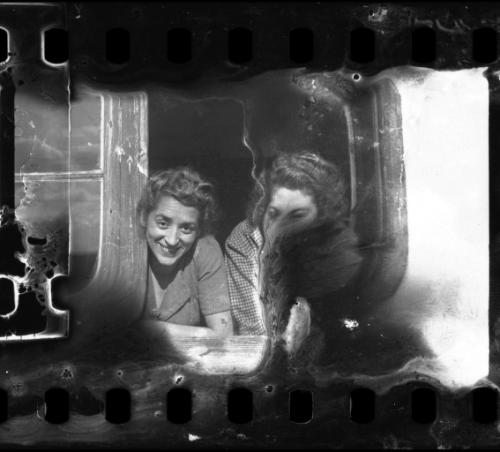 Stefania Schoenberg and Inka Z. posing in a window