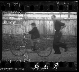 Portrait of a boy on a bike