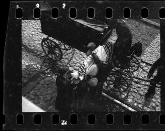 "A corpse is taken away."