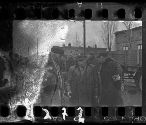 Three Jewish policemen talking in the street