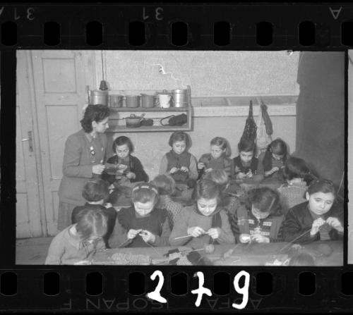 Children learning to knit with Mrs. M. Bronowska