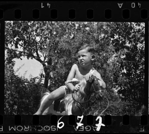 A child on a rocking horse