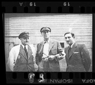 Dr. Avraham Ast with the veterinarian, Dr. Leider and Dr. Leon Glazer in the ghetto
