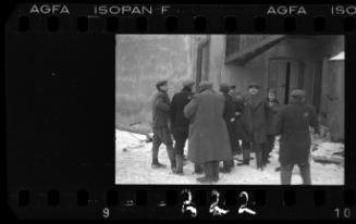 Residents gathered in the street in winter