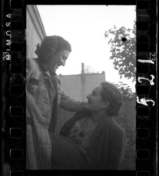 Two women looking at each other