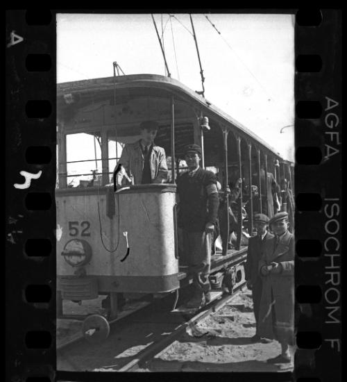 Transport Department workers and residents on tram #52 during deportation action