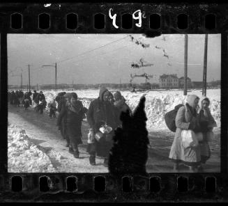 Residents walking to deportation in winter