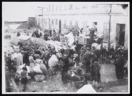 Residents sorting sacks