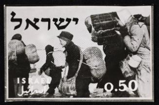 Boy in cap, with satchel and sack tied to back, walking with winter deportation crowd - side-profile