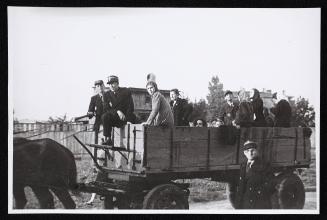 Deportation of the sick, led by Jewish police in a horse-drawn wagon