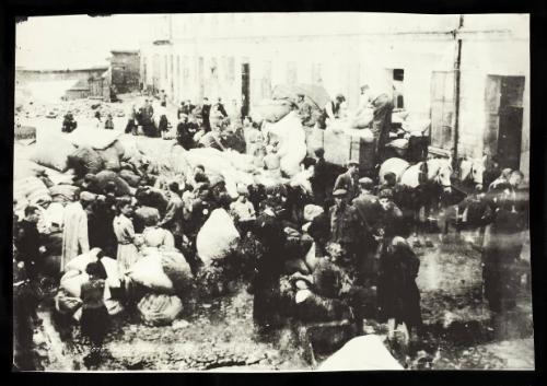 Residents sorting sacks