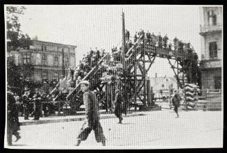 Ghetto residents crossing bridge