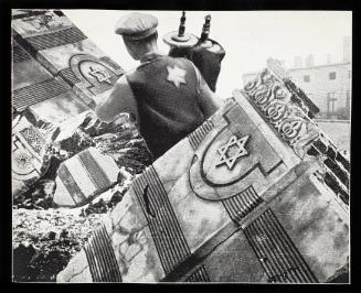 “Jew in the Ghetto saves Holy Scrolls.”  (p.21)