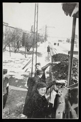 Women unloading coal
