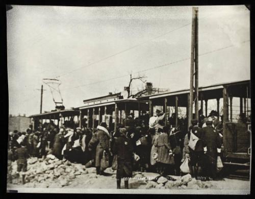 Boarding tram for deportation
