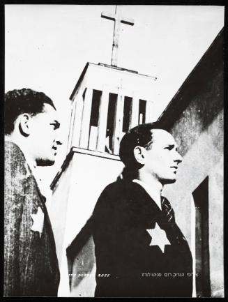 Close-up profile of two men with church steeple in background