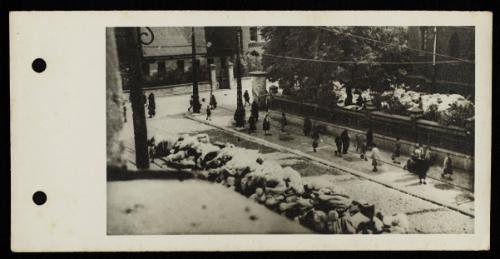 "The Catholic Church in Kosielny Square, in which the Nazis collected down and feathers [in bags] taken from Jews, for transport to Germany."
