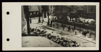 "The Catholic Church in Kosielny Square, in which the Nazis collected down and feathers [in bags] taken from Jews, for transport to Germany."
