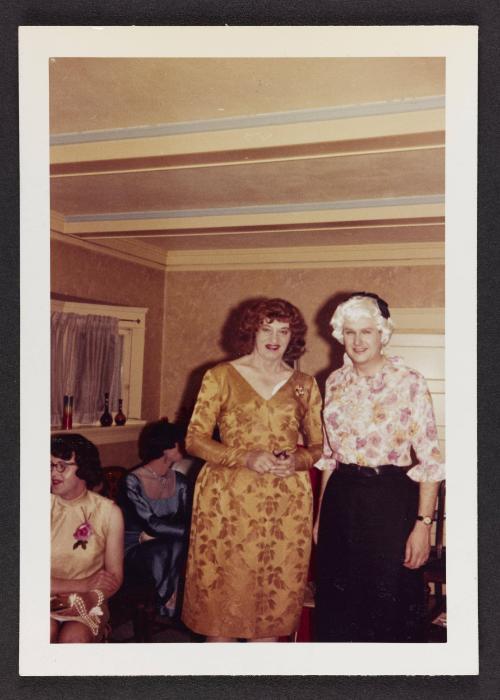 [Gloria and a friend standing together, location unknown]
