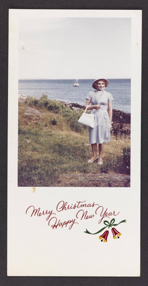 [Christmas card, Edith standing by water, location unknown]
