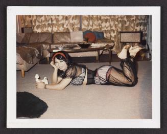 [Lili in lingerie in Susanna and Marie’s New York City apartment]
