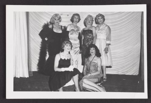 [Susanna in a leopard print dress with five friends on the stage at Chevalier d'Eon, Hunter, NY]
